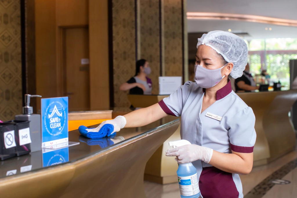 Well-trained hospitality worker in Vientiane, Laos, during the COVID-19 pandemic.