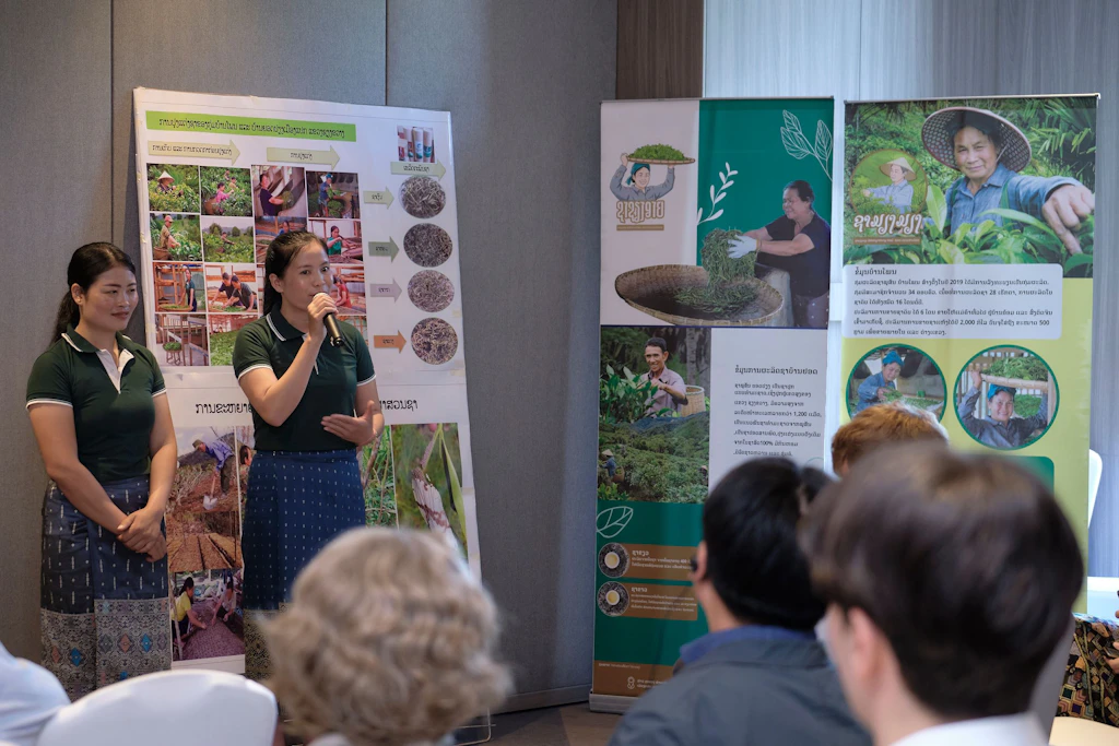 Young tea experts presenting the tea to stakeholders at the LURAS project closure event.